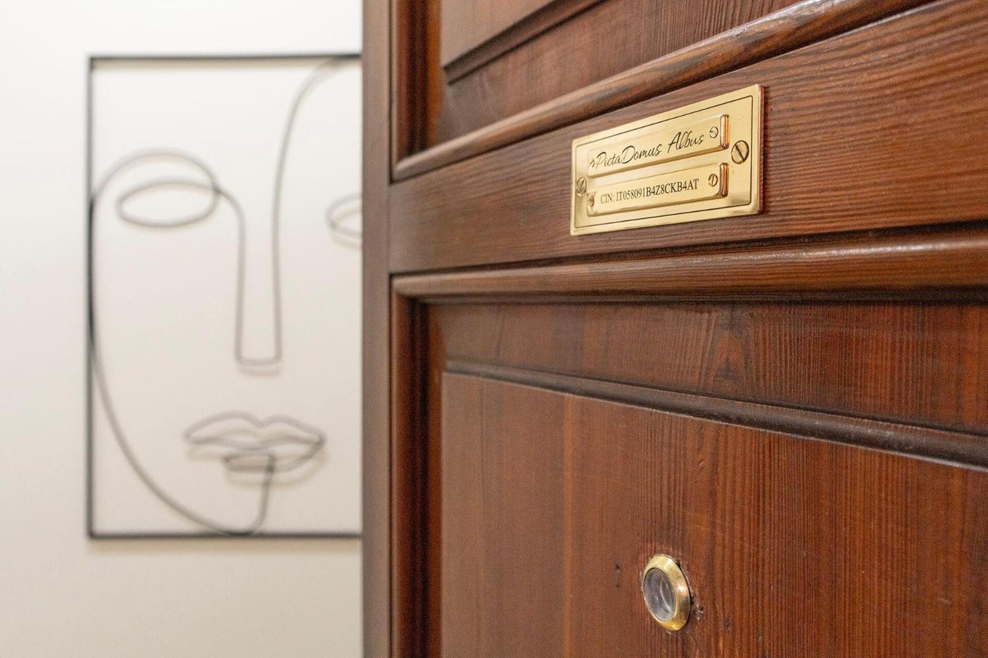 Pictadomus-albus, Metro Furio Camillo Apartment *